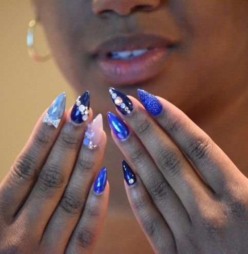pretty-african-american-woman-with-pointy-manicure-2024-10-18-05-28-07-utc